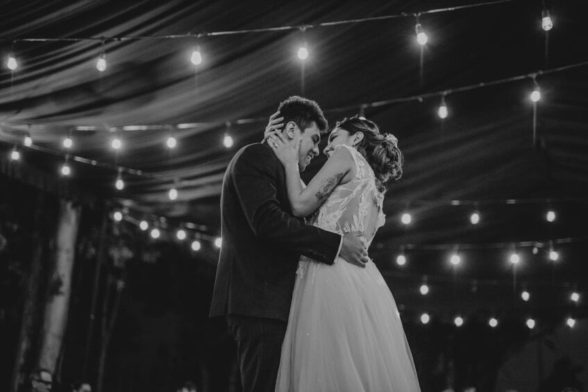 A happy couple dancing on their wedding