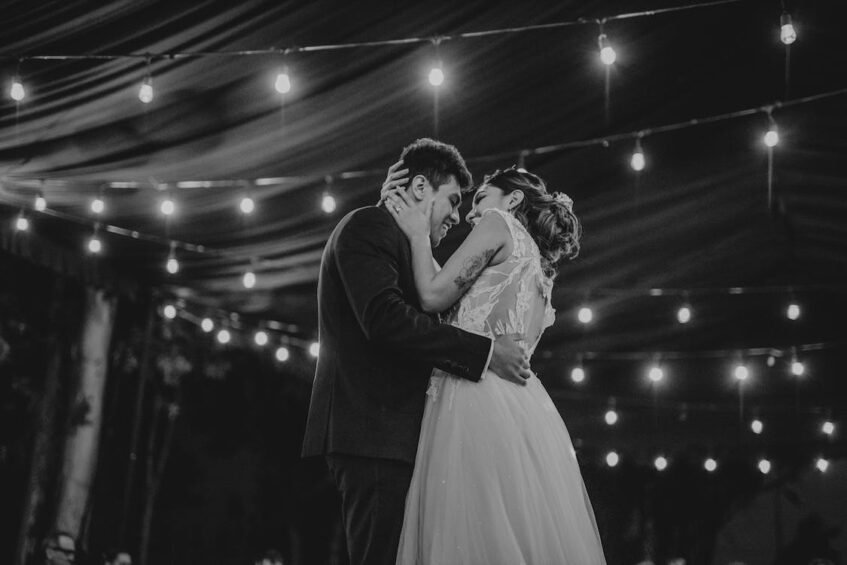 A happy couple dancing on their wedding