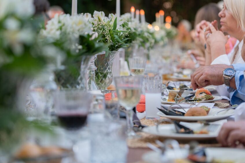 wedding guests seated at the table